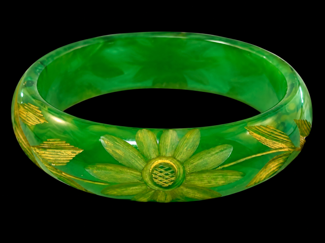 flower carved cloudy marbled green bakelite bangle